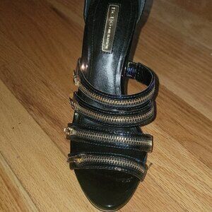BCBGMaxAzria Black and Gold Heels with Sleek Design